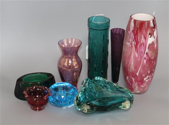 A Whitefriars style green textured cased glass vase and seven items of coloured glassware,